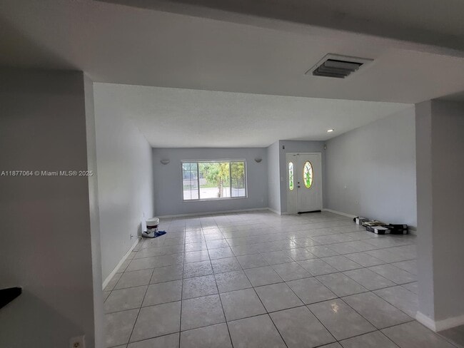 Building Photo - 9749 SW 213th Ter