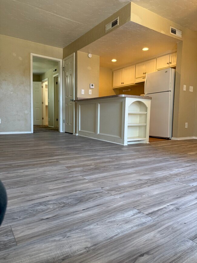 Foto 3 de la sala de estar - The Colonies Apartments