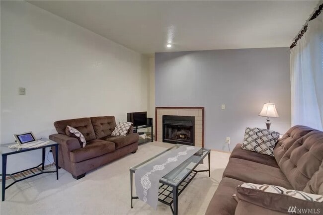 Livingroom with fireplace - 17306 119th Ln SE