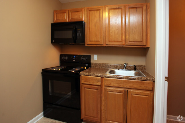 Small Studio Furnished Kitchen - Forest Ridge Apartments