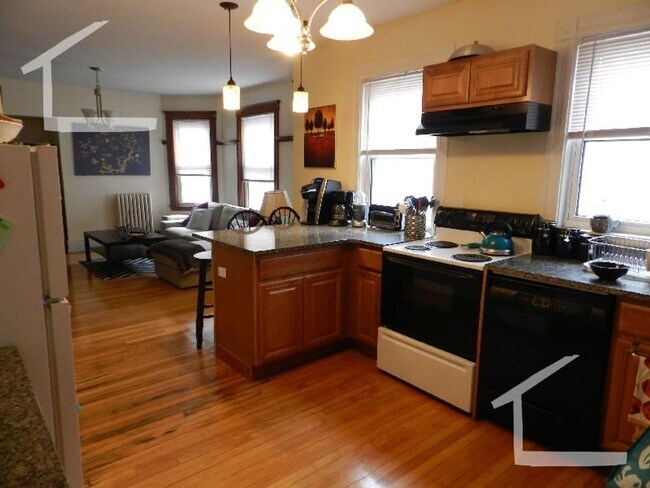 Building Photo - Recently Renovated Unit at Oak Sq. Laundry...