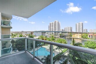 Building Photo - 19390 Collins Ave
