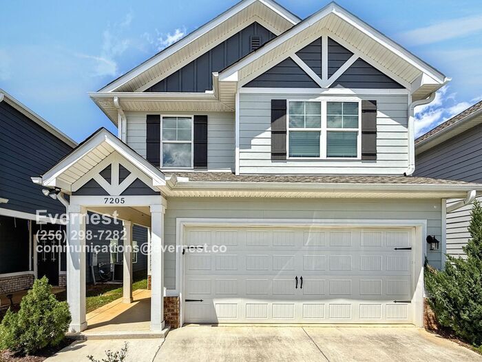 Primary Photo - Spacious and Bright 3-Bedroom Home in a Co...