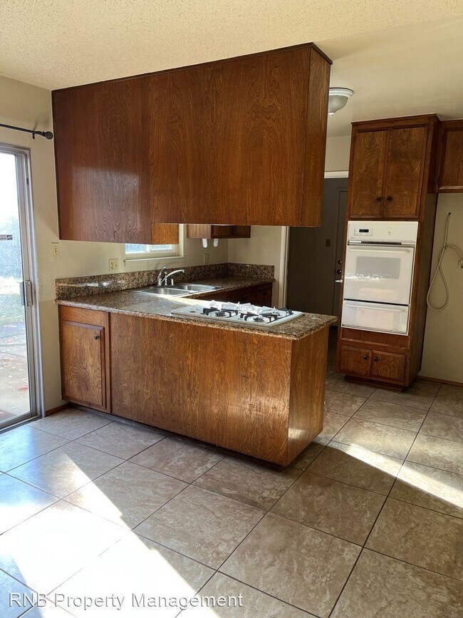 Building Photo - 3 br, 2 bath House - 2552 Warrego Way