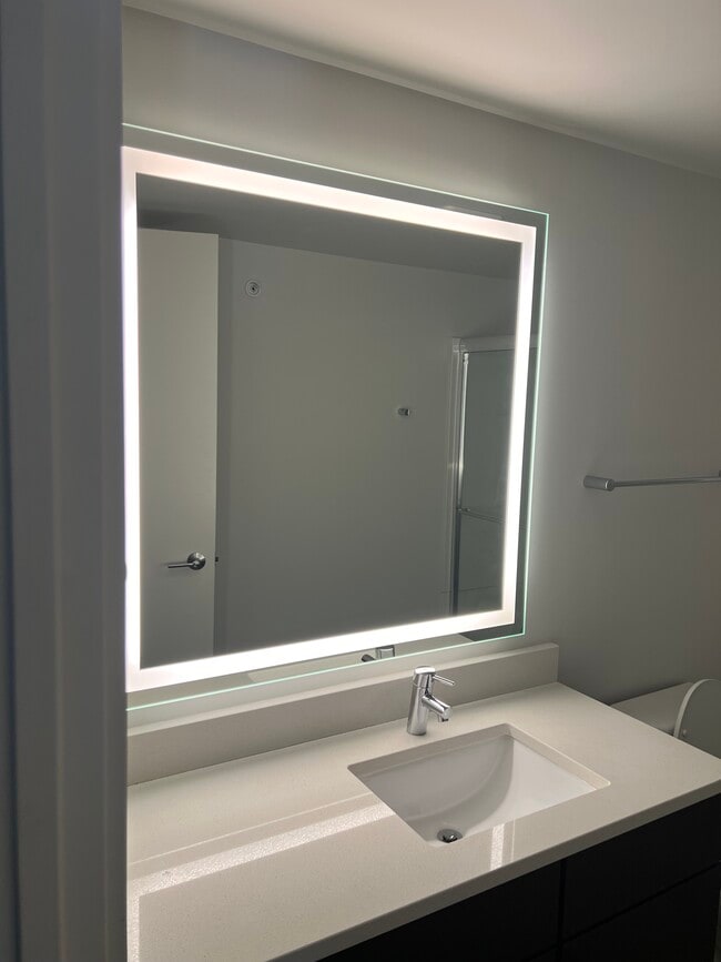 Lighted mirrors - Vantage on the Park