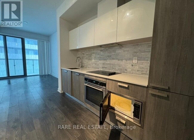 Building Photo - 50 Charles St E