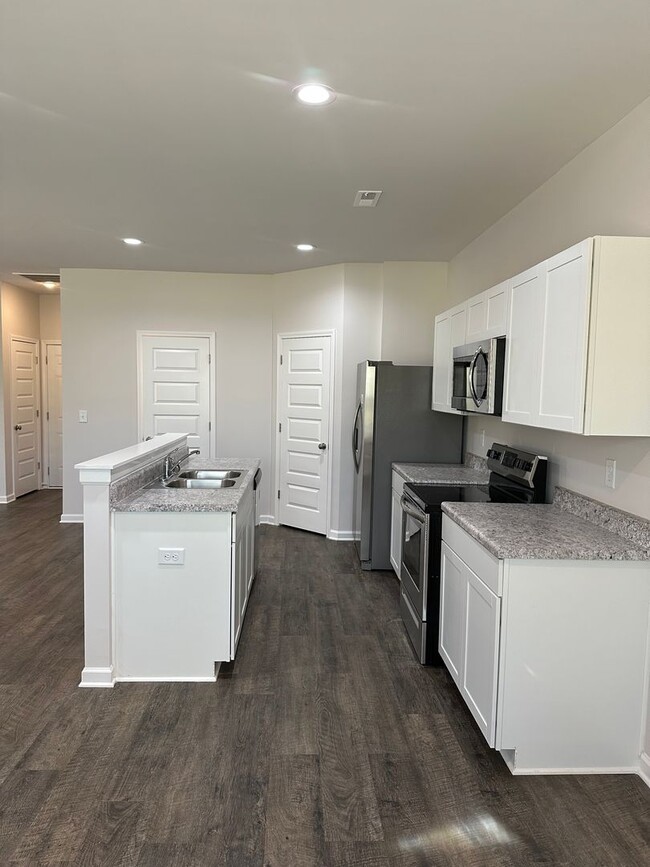 Building Photo - *Pre-Leasing* NEW Three Bedroom | Two and ...