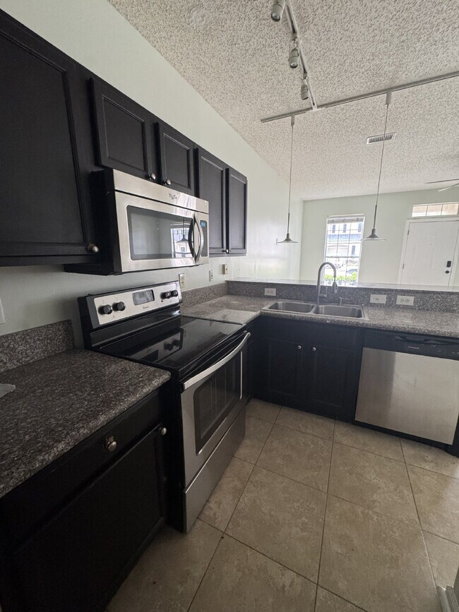 Building Photo - Modern 3-Bedroom Townhome with 2 car garage