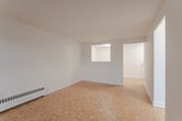 This well-appointed one-bedroom, one-bathroom unit at 444 Victoria Rd N in Guelph offers a thoughtfully laid-out floor plan across a single level. Warm parquet flooring flows throughout the living, dining, and bedroom areas, lending a classic character to the bright, white-walled interior. The open living and dining area is generously sized, with a pass-through window connecting to the kitchen and direct access to a private balcony through sliding glass doors, framing pleasant views of the surrounding greenery. The kitchen is equipped with a stainless steel electric range, over-the-range microwave, and a clean white subway tile backsplash, creating a functional and modern cooking space. The bedroom is a comfortable size, featuring a sliding-door closet, parquet flooring, and a window that fills the room with natural light. A baseboard heating system is present throughout. The full bathroom offers a soaker tub/shower combination finished with classic white subway tile from floor to ceiling, chrome fixtures, and neutral tile flooring. A hallway with a dedicated closet provides convenient entry storage, completing this clean and practical residential unit in Guelph's north end.