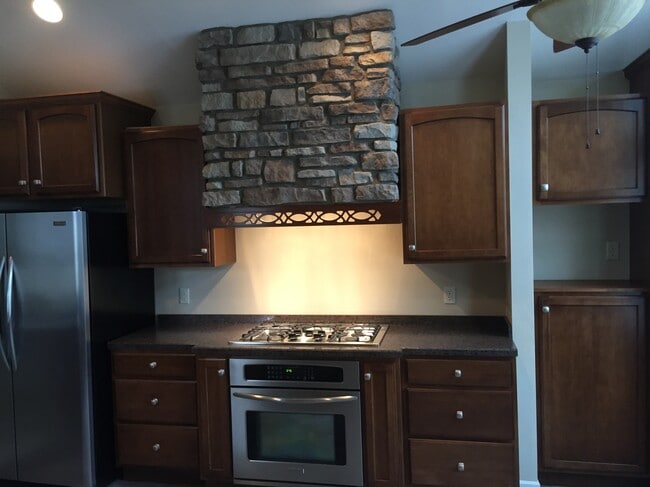 Custom stone hood - 4980 Tippecanoe Rd