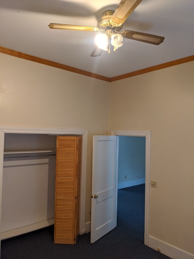 Master bedroom, high ceilings, north facing windows, large closet - 332 N Main St
