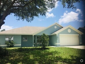 Building Photo - 1044 SW Ingrassina Ave