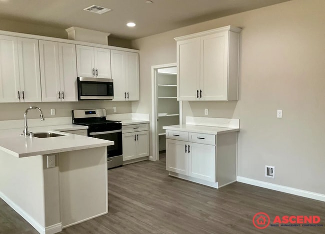 Building Photo - Spacious 4-Bedroom, 2-Bath Home with Fireplace, Garage & Full Appliances — No Pets