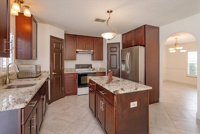 Building Photo - Comfort Meets Style in This Spacious Corner-Lot Home with Bonus Flex Room