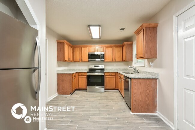 Foto del edificio - 6825 Mahonia Pl