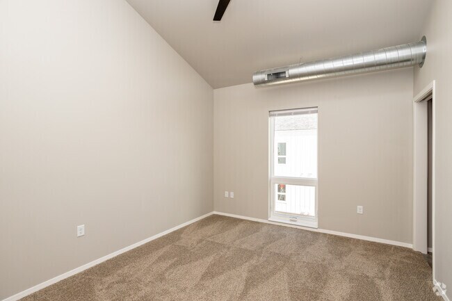 2BR, 2BA - 870SF - Primary Bedroom - Prairie Towers - Lavish Living