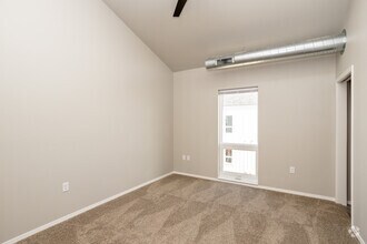 2BR, 2BA - 870SF - Primary Bedroom - Prairie Towers