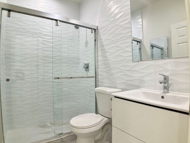 Building Photo - FULLY Remodeled. BRIGHT! In-Unit W/D, Stainless Appliance Package, MODERN!