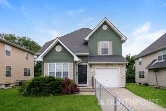 Building Photo - 4211 Woodland Ave