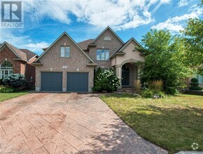 Building Photo - 529 Falconridge Crescent