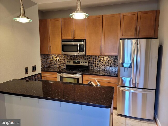 Foto del edificio - Charming 1BR/1BA Condo in Sought-After Pen...