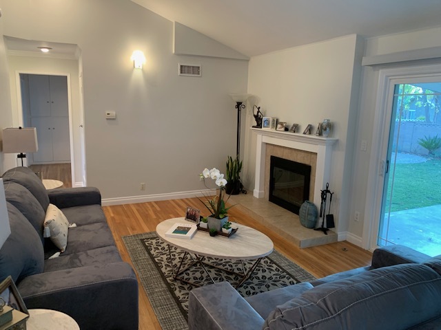 Living room with fireplace - 8109 Glade Ave