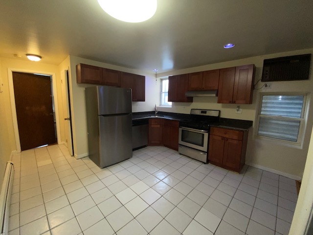 Kitchen Open floor concept. Features Stainless Steel Refrigerator, Stove, and Dishwasher - 787 Broadway