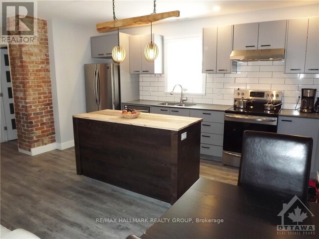 Photo du bâtiment - 381-381 Cooper St