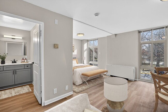 Welcome to Merrill House Apartments, where modern comfort meets style. This inviting space features an open layout, chic furnishings, and natural light throughout. Ready to find your perfect home? Schedule a tour today! - Merrill House Apartments