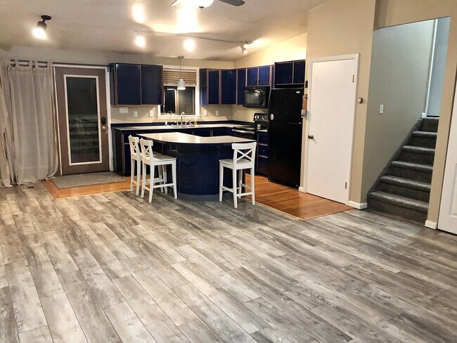 1st floor living room/kitchen (Kitchen entrance from back deck) - 1128 1st Ave
