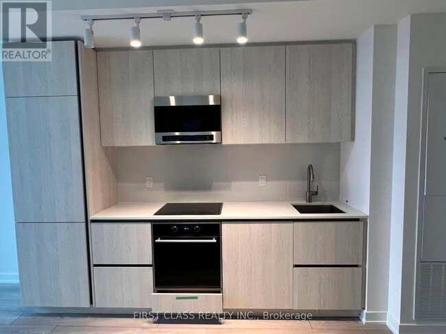 Building Photo - 110 Broadway Ave