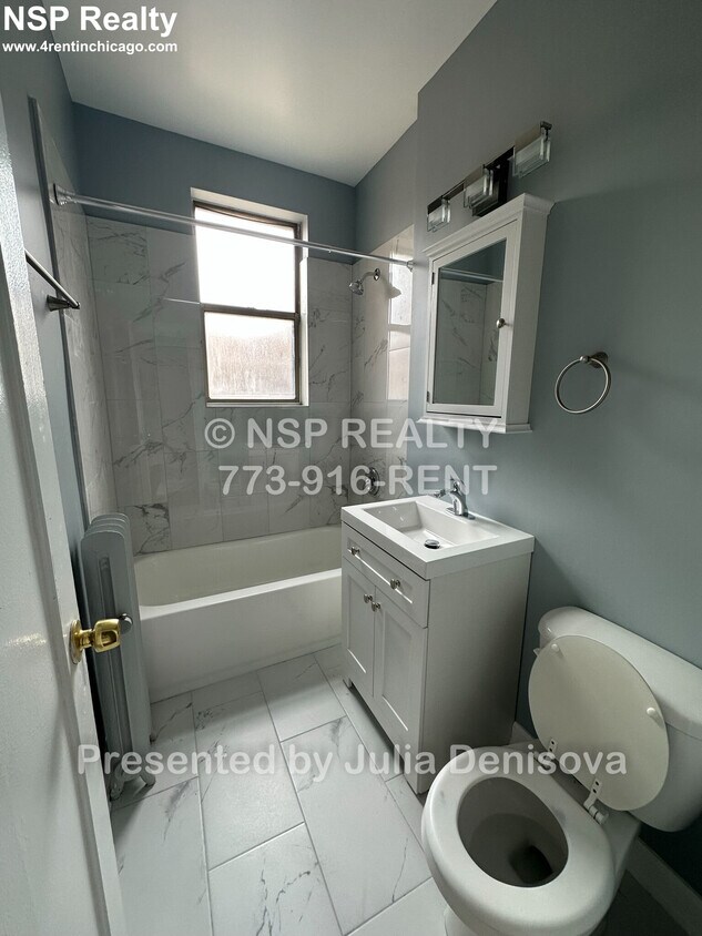 Building Photo - 1369 W Estes Ave