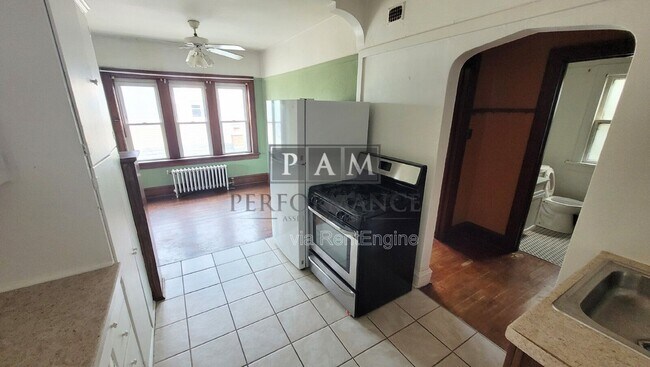 Building Photo - 3927 E Layton Ave