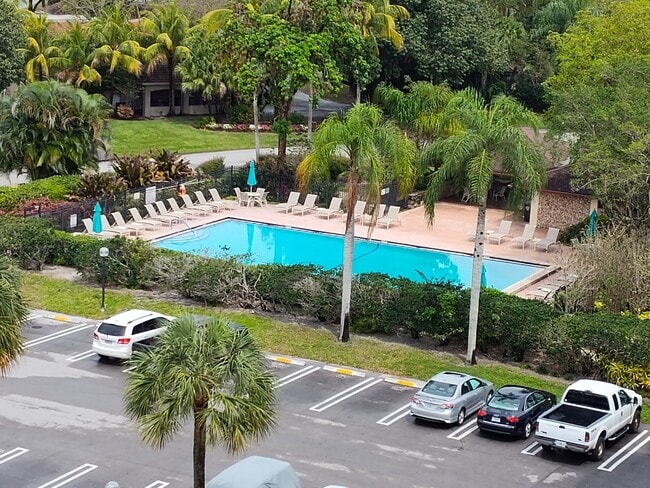 Building pool and grill out area - 3050 N Palm Aire Dr