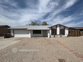 Building Photo - 8638 W Lawrence Ln
