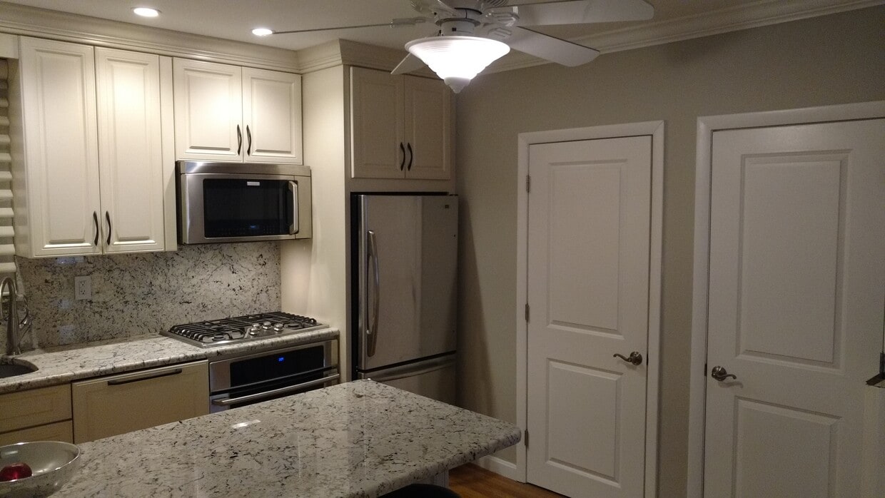 Kitchen with extra large fridge freezer - 651 Bennington St