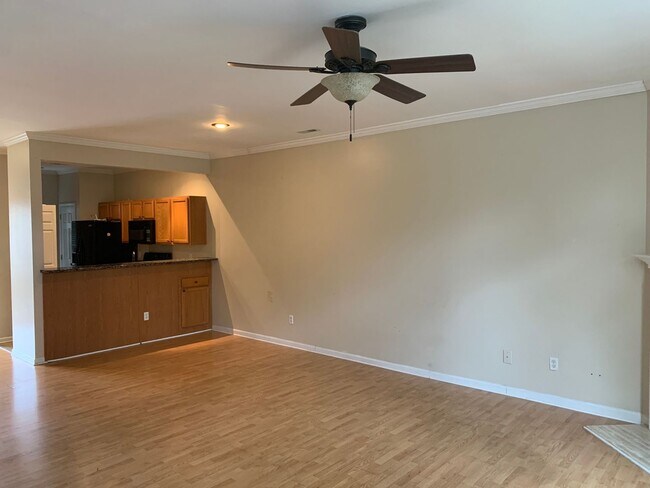 Building Photo - Move In Ready Townhome located in the Town...
