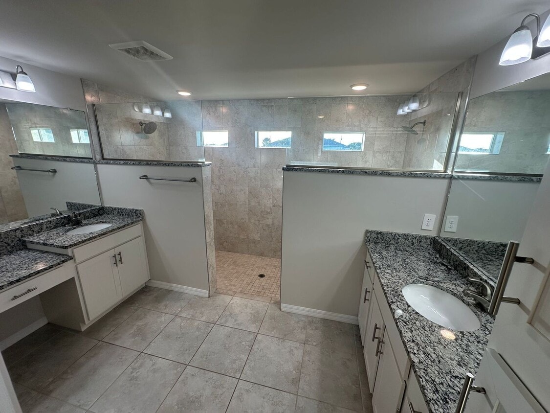 Building Photo - * COMING SOON * 4 Bedroom 2 bathroom NE Cape Coral Home with Screened Lanai