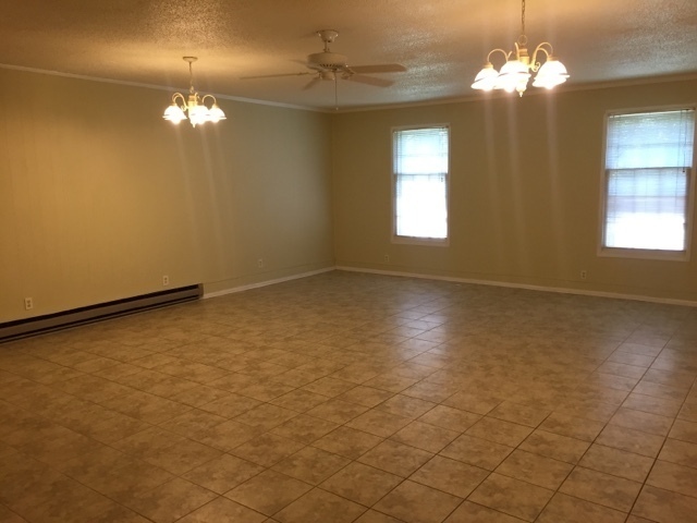 Building Photo - Spacious brick ranch with 4 Car Garage