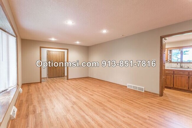 Building Photo - A MUST SEE at 143th and Quivira!