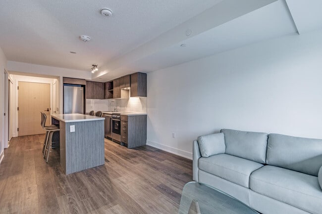 Building Photo - One Plus Den Furnished unit