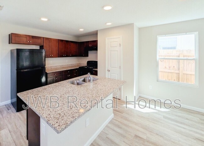 Building Photo - 8736 Eaton Ave
