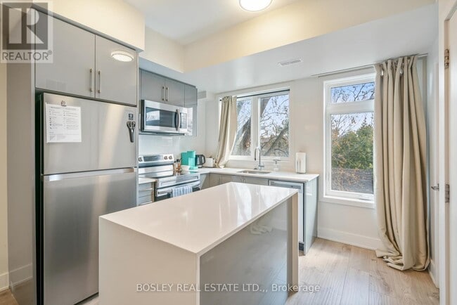 Building Photo - 6065 McLeod Rd