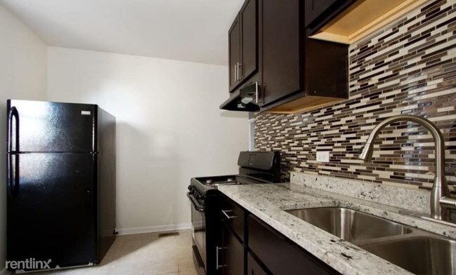 Foto del edificio - 3 br, 1 bath Apartment - 7201 S Perry Ave