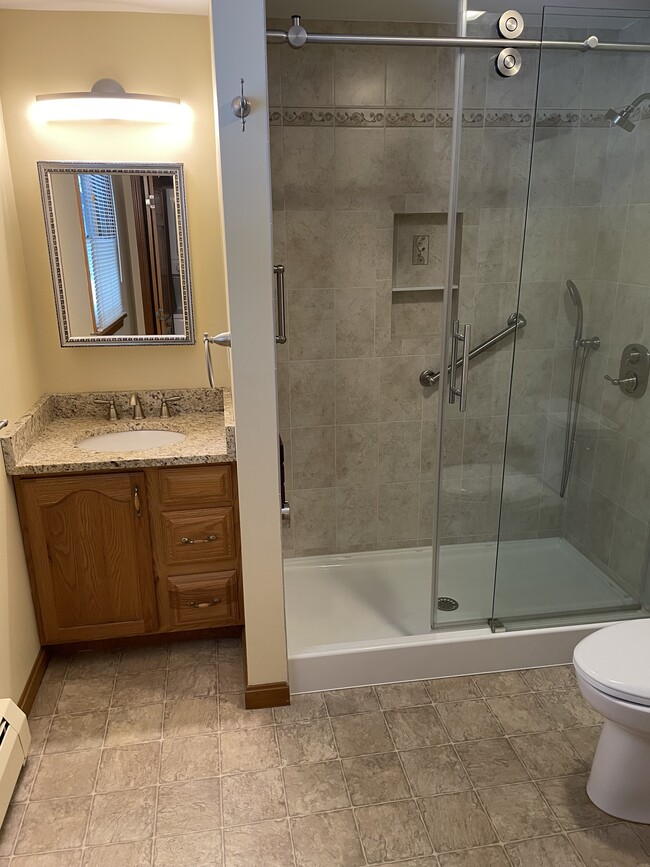 Walk-in shower. - 123 Riverlin St