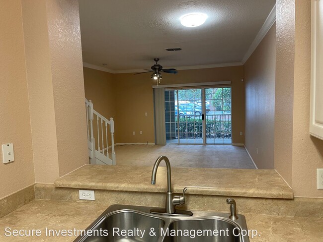 Building Photo - 2 br, 2.5 bath House - 4961 NW 43rd Avenue...