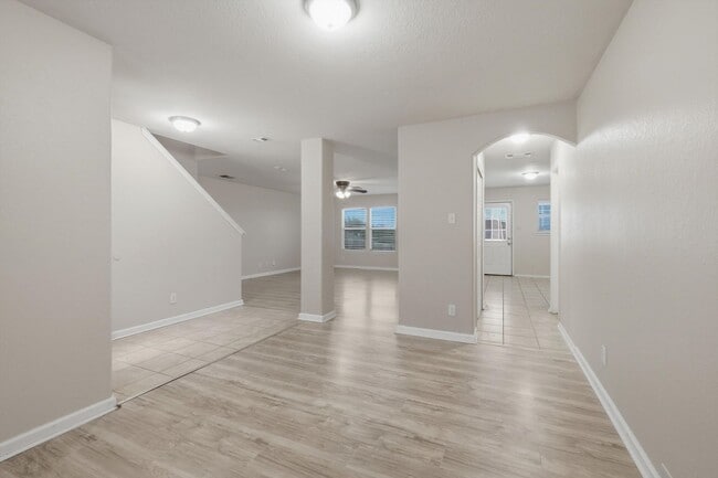 Photo - 4BR Home with Open Living Area & Included Appliances