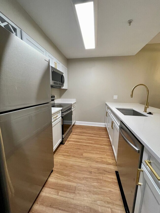 Building Photo - Fully Renovated 2B/2B condo located behind...