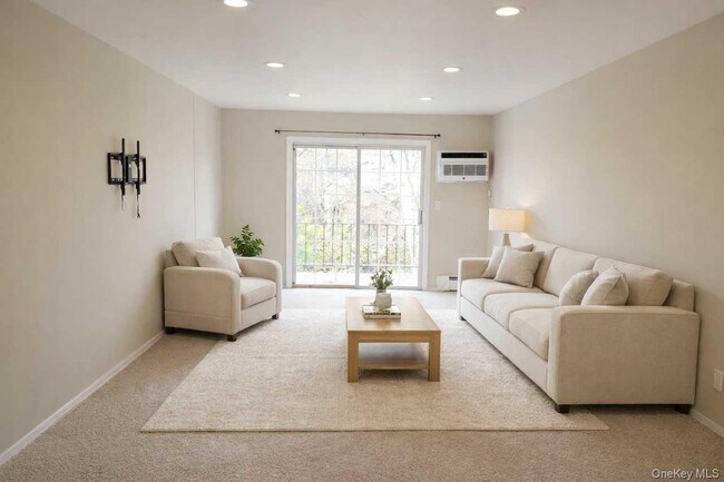 Foto del edificio - 100 Town House Village