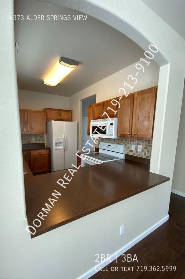 Building Photo - Two Story Condo Gated Community